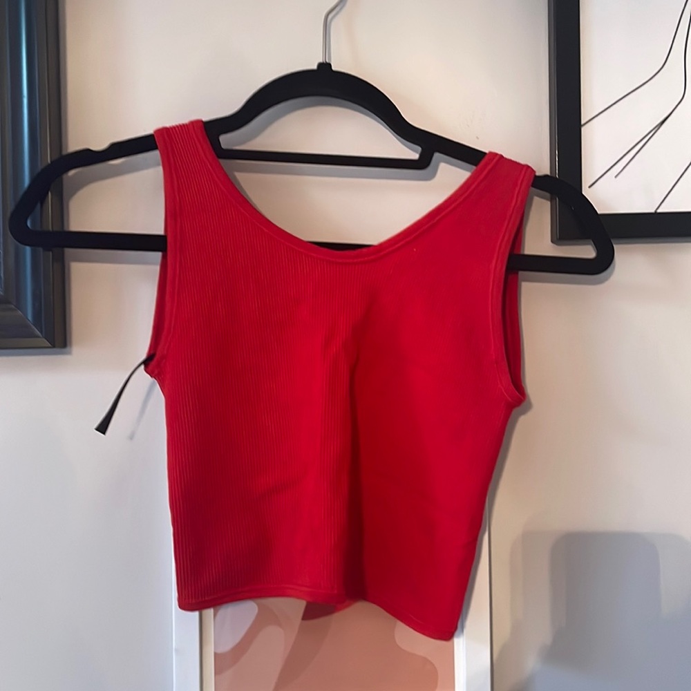 Urban Outfitters red tank top, crisscross back. Size SM. Like new condition.